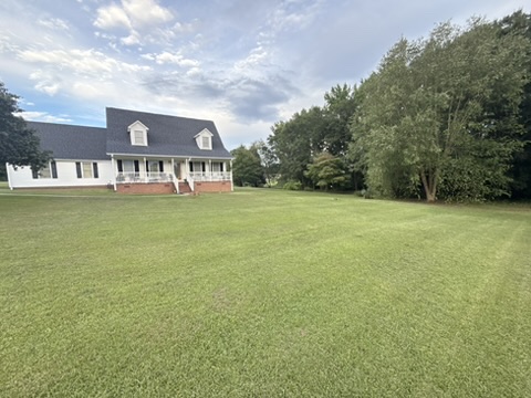 Beautiful home with maintained lawn